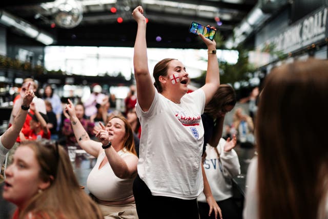<p>Fans celebrate as England win on penalties during a screening of the FIFA Women's World Cup 2023 round of 16 match between England and Nigeria at BOXPARK Wembley</p>