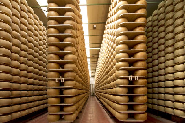 <p>Italian man dies after being crushed by thousands of wheels of Gran Padano cheese </p>