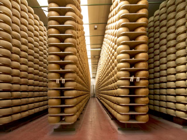 <p>Italian man dies after being crushed by thousands of wheels of Gran Padano cheese </p>