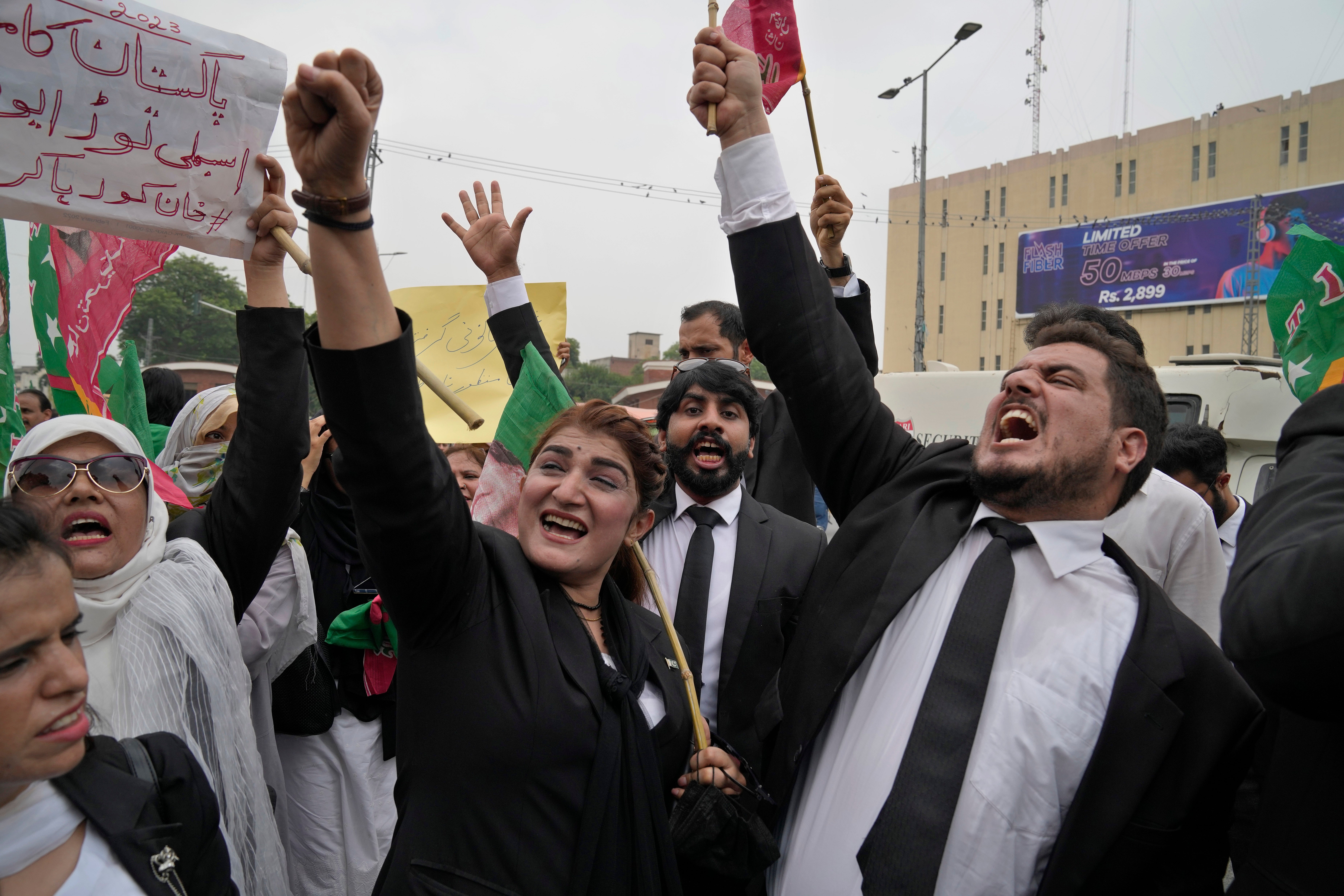 Lawyers chant slogans during a protest against Khan’s imprisonment