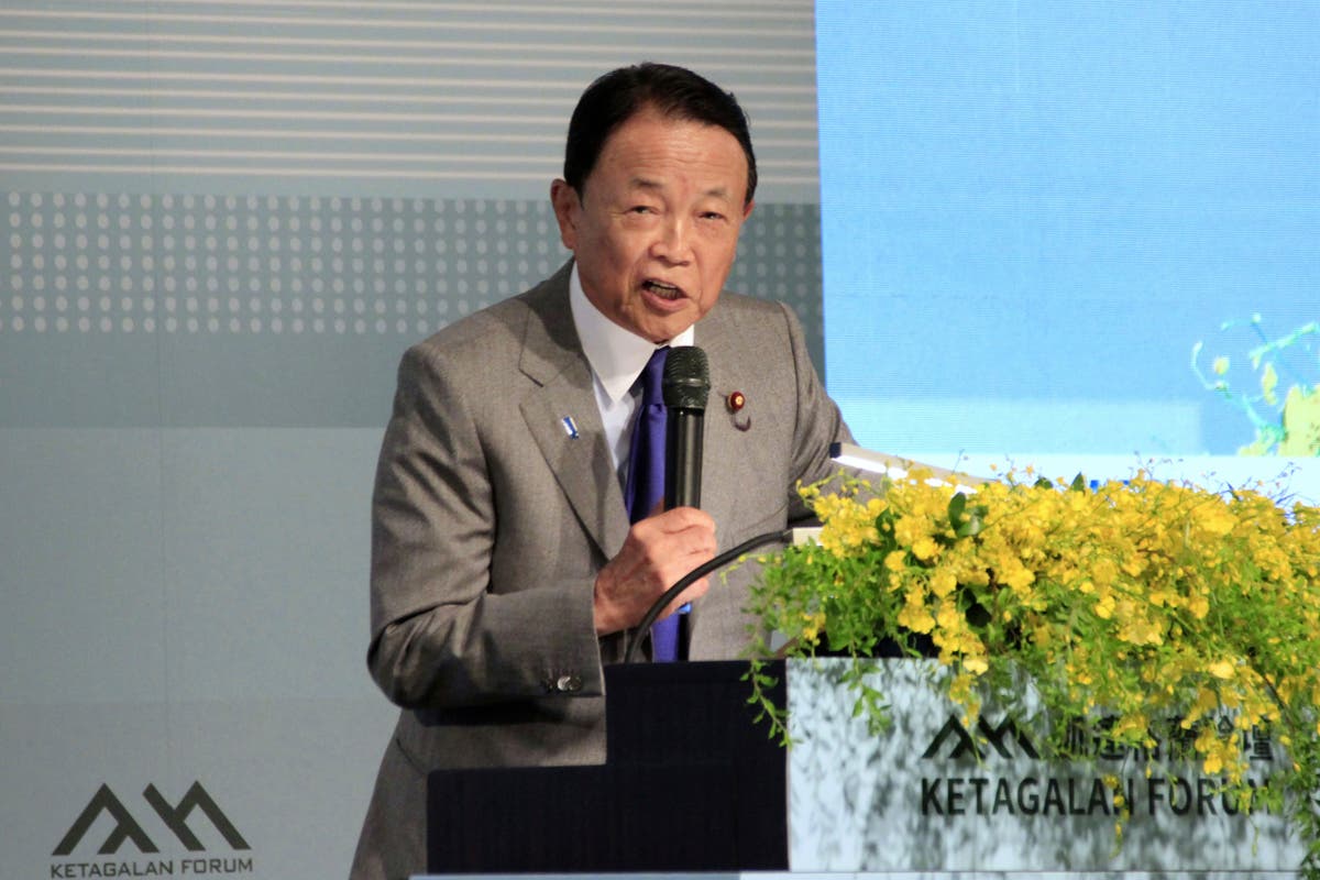 Japanese political leader Taro Aso calls for peace in the Taiwan Strait as Tokyo expands defense
