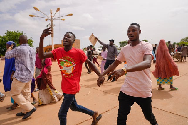 <p>File. Supporters of Niger’s ruling junta cheer in Niamey, Niger, Sunday, 6 August 2023 </p>