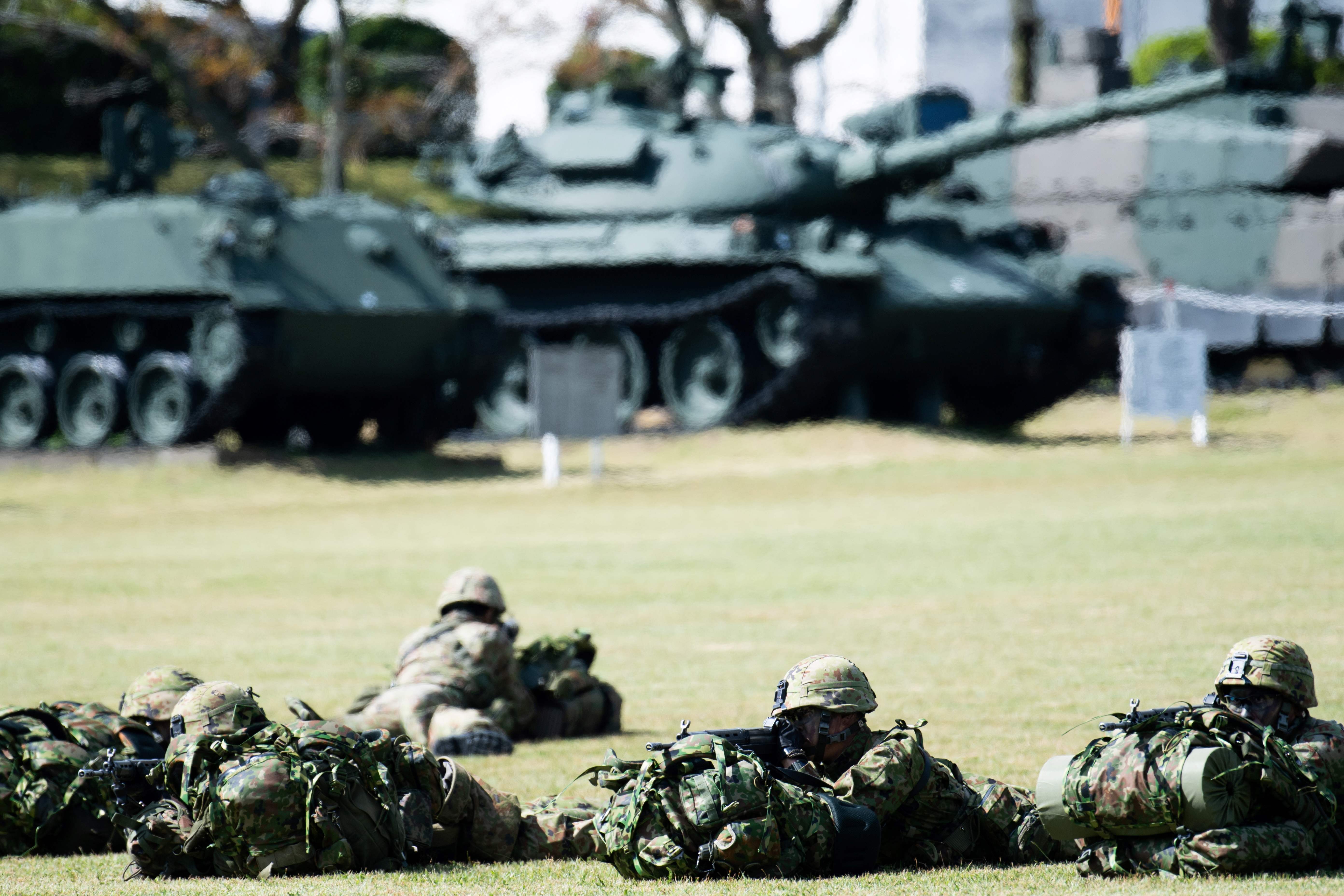 File: Soldiers of the British army and the Japanese Self Defence forces take part in a joint military drill in Oyama