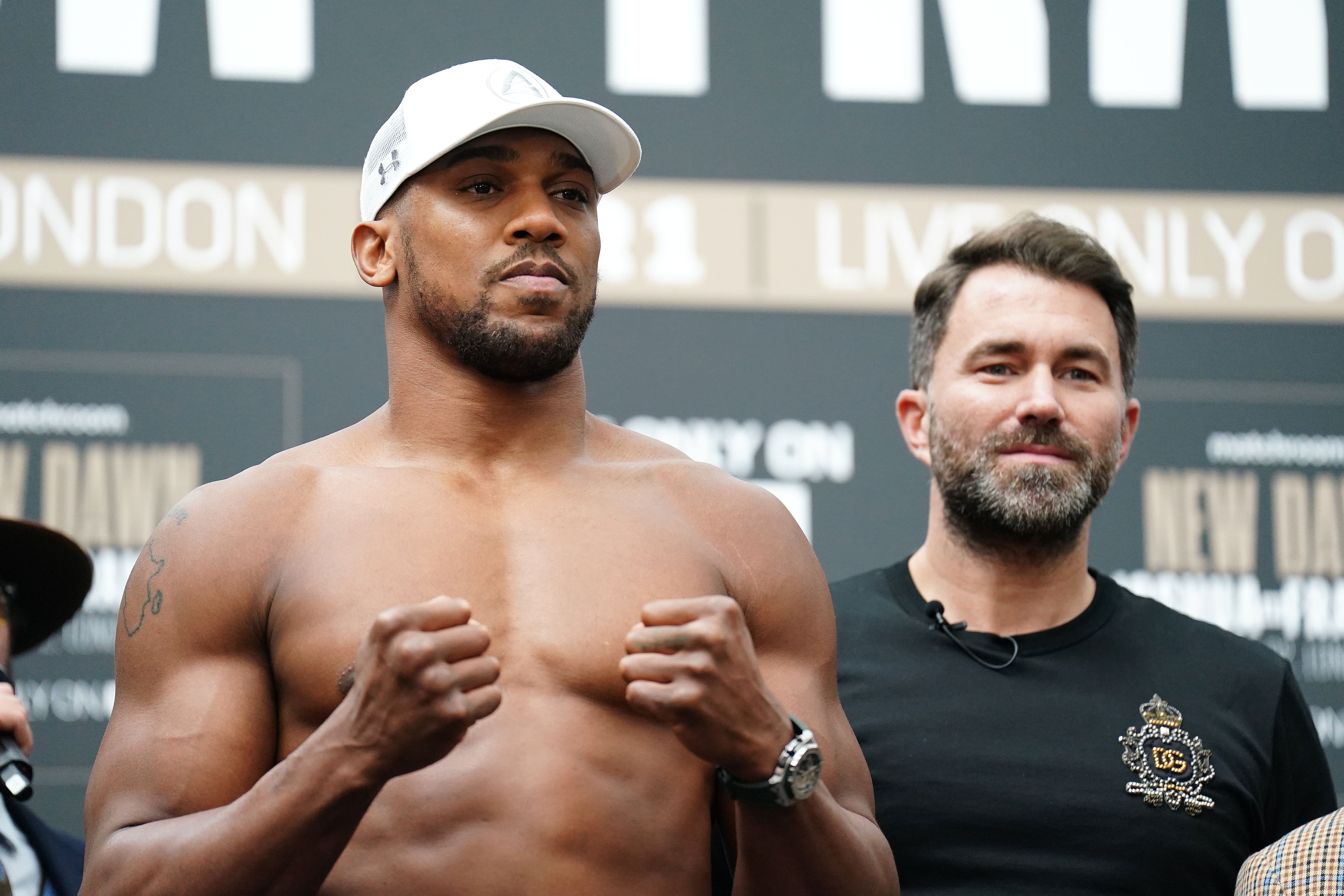 <p>Hearn, right, with former two-time world heavyweight champion Anthony Joshua </p>