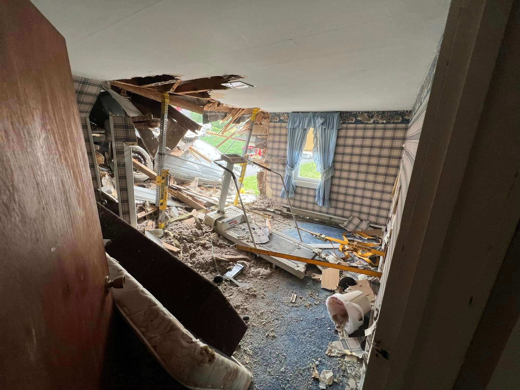 Car crashing into a room on the second floor of a Pennsylvania home