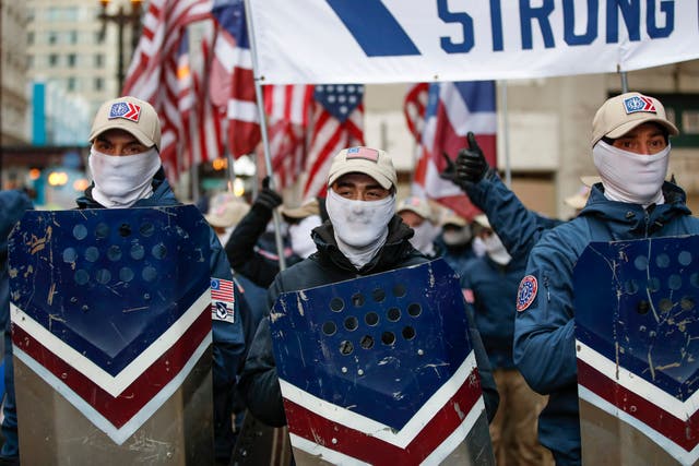 <p>Members of the white nationalist group Patriot Front are pictured marching in Chicago on 8 January, 2022.</p>
