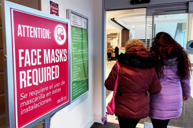 <p>A sign displaying masks required in Buffalo, New York, earlier this month </p>