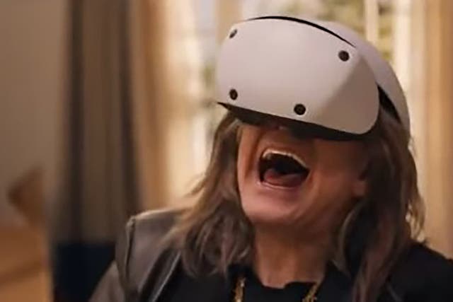 Ozzy Osbourne tries out a VR headset as part of the tweet which has been banned (Screengrab from video/PA)