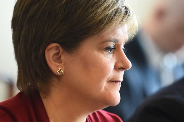 Nicola Sturgeon said she will dedicate the book to her late uncle, who was a journalist (Andy Buchanan/PA)