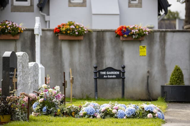 Flowers at the grave of Sinead O’Connor in The Garden section of Deansgrange Cemetery, Dublin (Liam McBurney/PA)