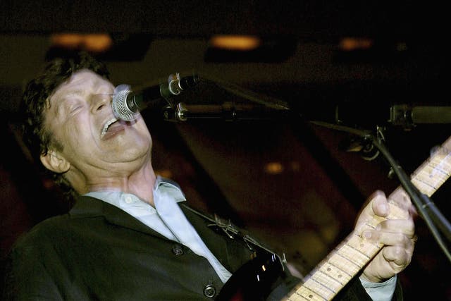 <p>Musician Robbie Robertson performs in 2004</p>