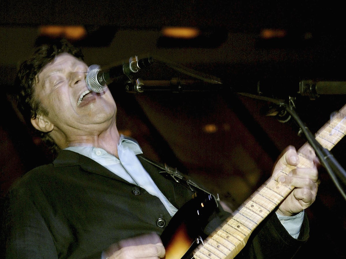 Robbie Robertson, lead guitarist and songwriter of The Band, dies at 80