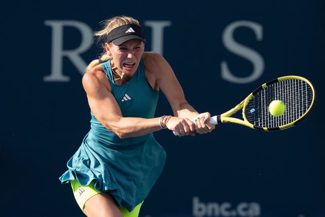Caroline Wozniacki hits a return to Marketa Vondrousova (Christinne Muschi/The Canadian Press via AP)