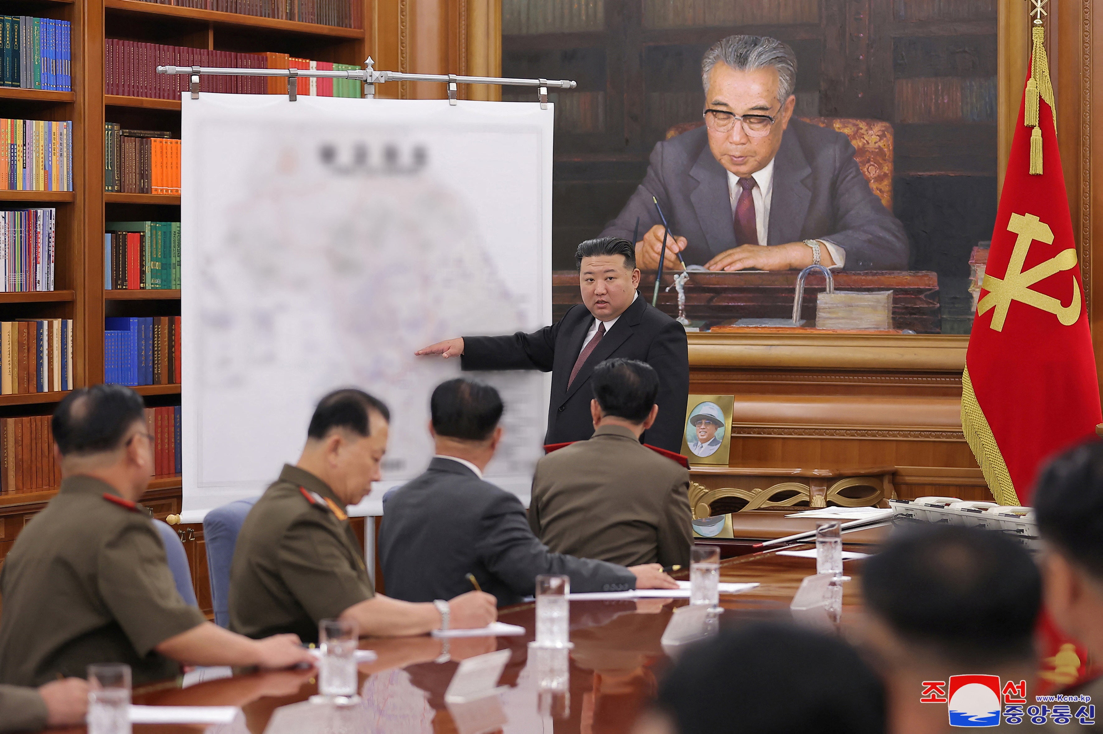 North Korean leader Kim Jong Un attends the 7th enlarged meeting of the 8th Central Military Commission of the Workers' Party of Korea