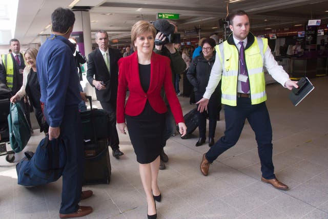 Nicola Sturgeon arrives at Edinburgh Airport before flying to London (Danny Lawson/PA)