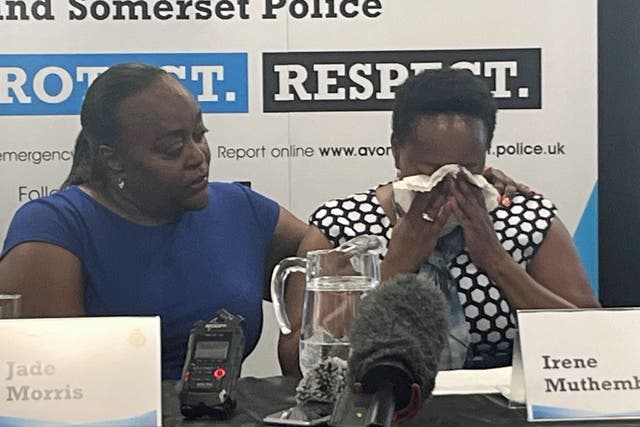 Jade Morris, left, the aunt of Eddie King Muthemba Kinuthia, comforts his mother, Irene Muthemba, as she appeals for information during an Avon and Somerset Police press conference in Bristol following Mr Kinuthia’s murder (Rod Minchin/PA)