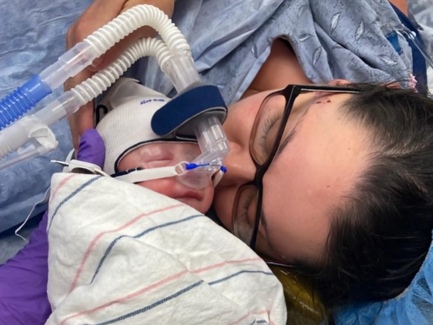 Angela Mercer holding her newborn baby at Brigham and Women’s Hospital