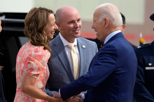 <p>Utah Gov. Spencer Cox and his wife Abby Cox greet President Joe Biden after he arrives at Roland R. Wright International Guard Base, Wednesday, Aug. 9, 2023, in Salt Lake City. (AP Photo/Alex Brandon)</p>
