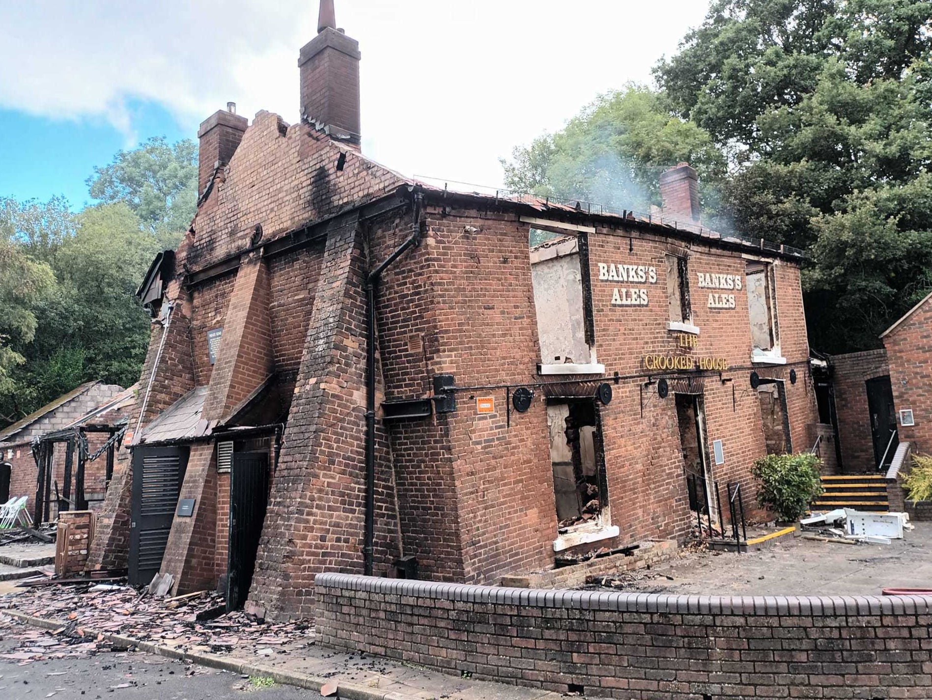 The pub had been shored up on one side