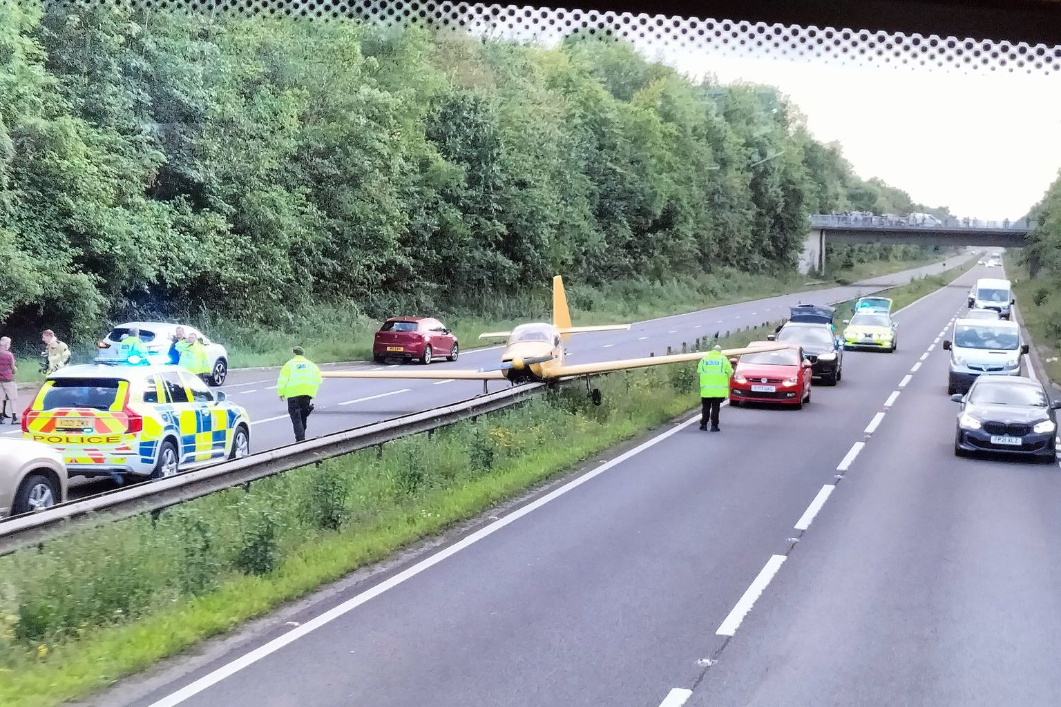 Handout photo taken with permission from the Twitter account @whothehellispoe of a light aircraft on the A40 (Who The Hell Is Vesper/Twitter/PA)