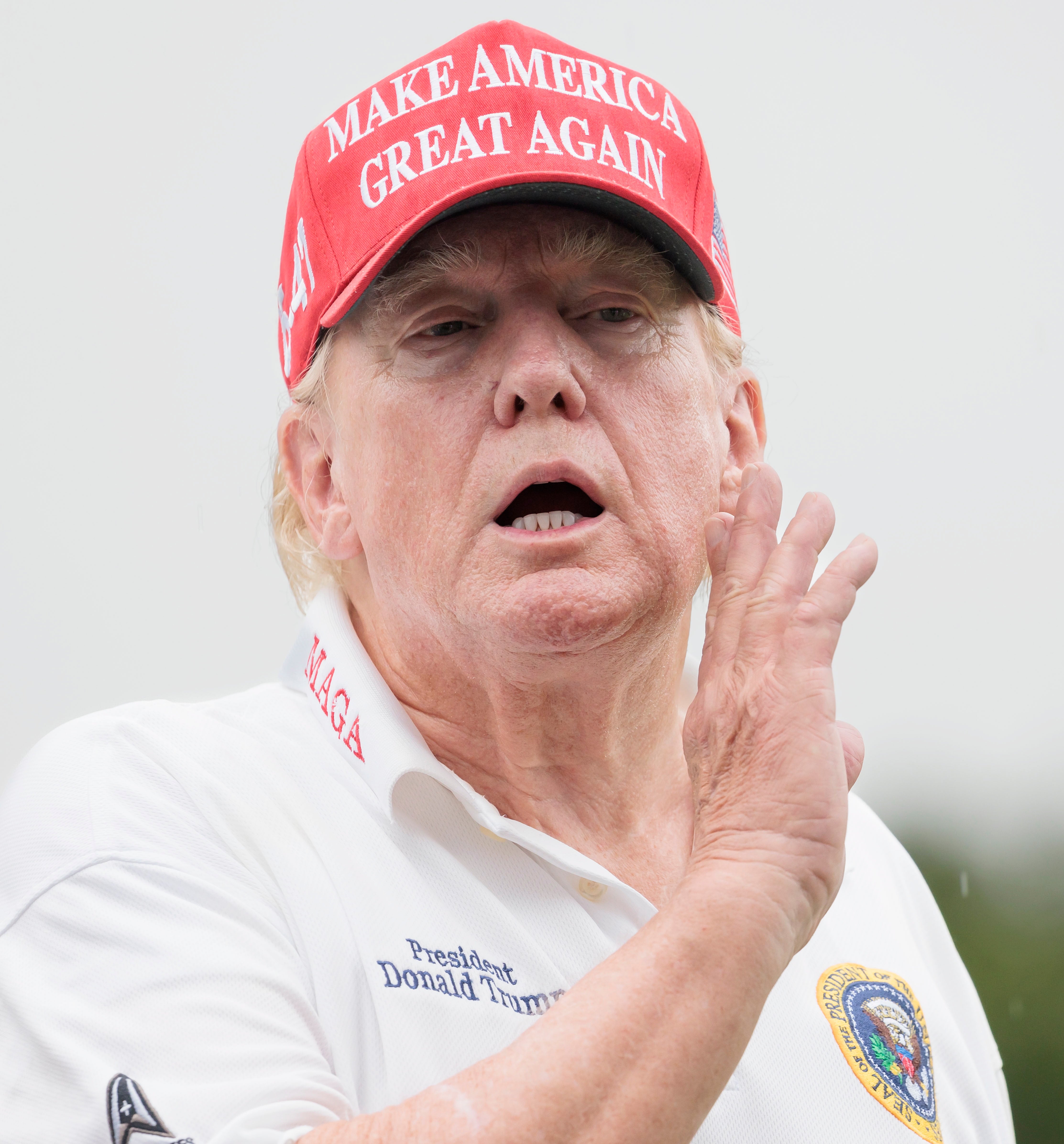 Trump taking part in a Pro-Am tournament at his golf club in Bedminster, New Jersey, on Thursday