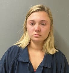 Fourth suspect charged with assault in Alabama riverfront brawl as she turns herself in to police
