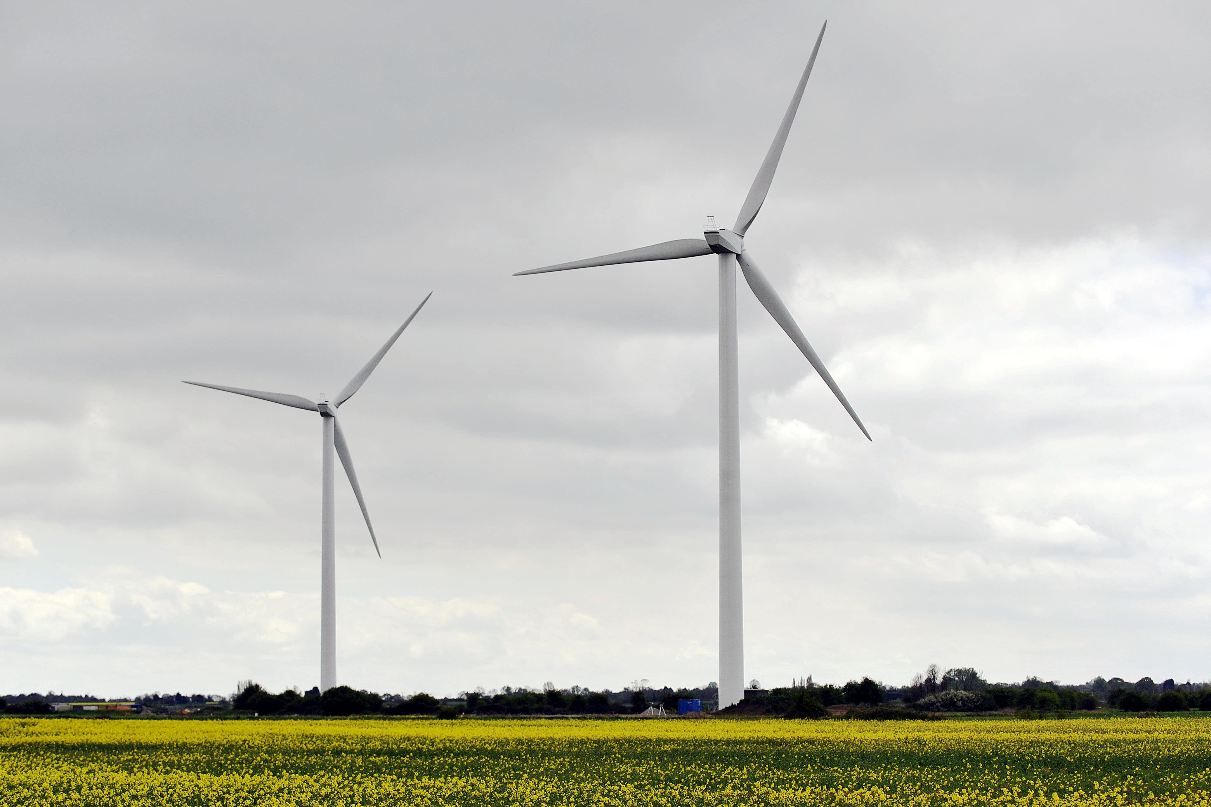 Communities will be able to win funding to set up projects like small scale wind farms (Nick Ansell/PA)