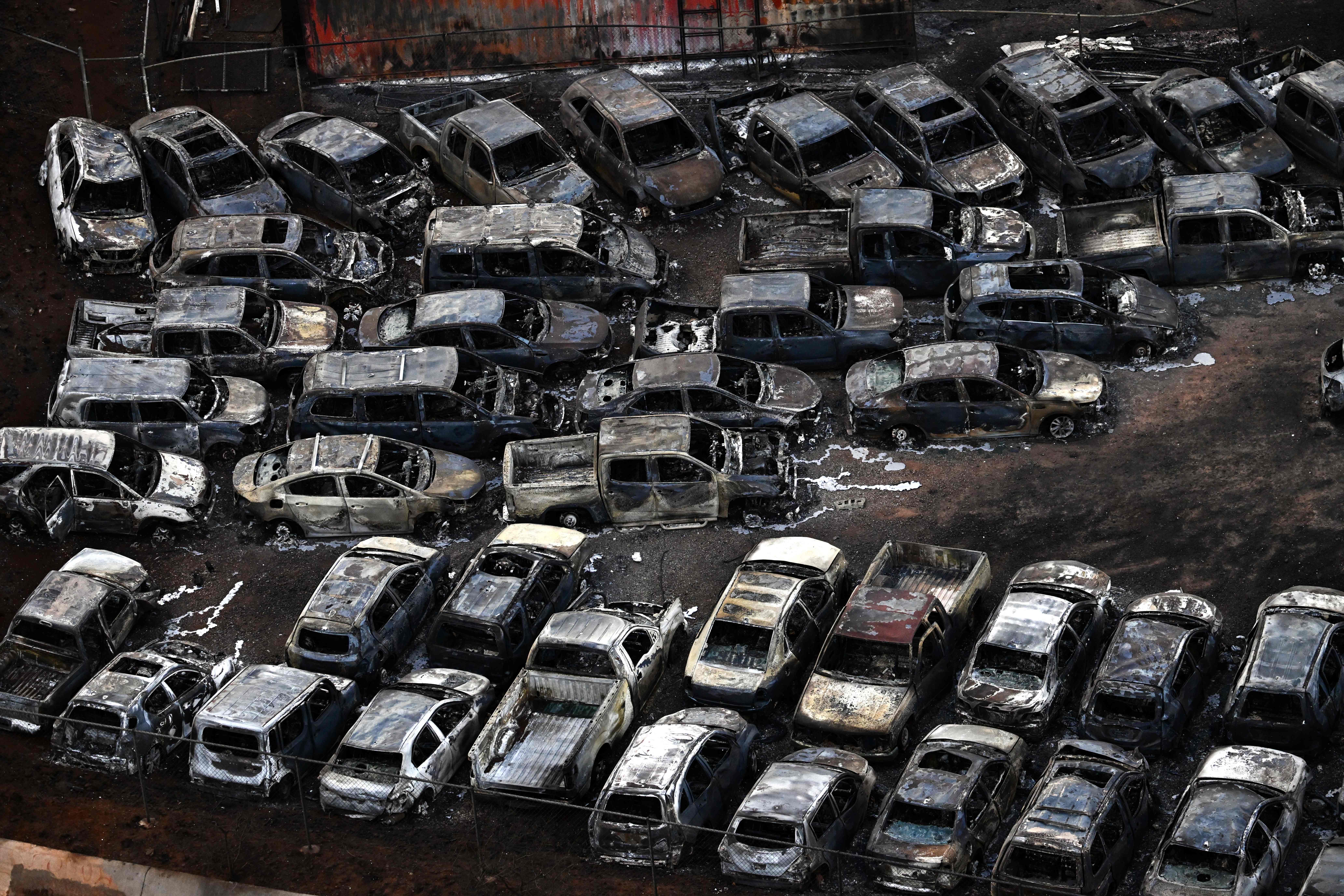 Destroyed cars in Lahaina in the aftermath of wildfires in western Maui, Hawaii