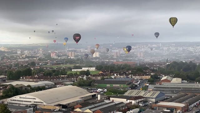 <p>Dozens of hot air balloons rise to transform Bristol’s skyline</p>