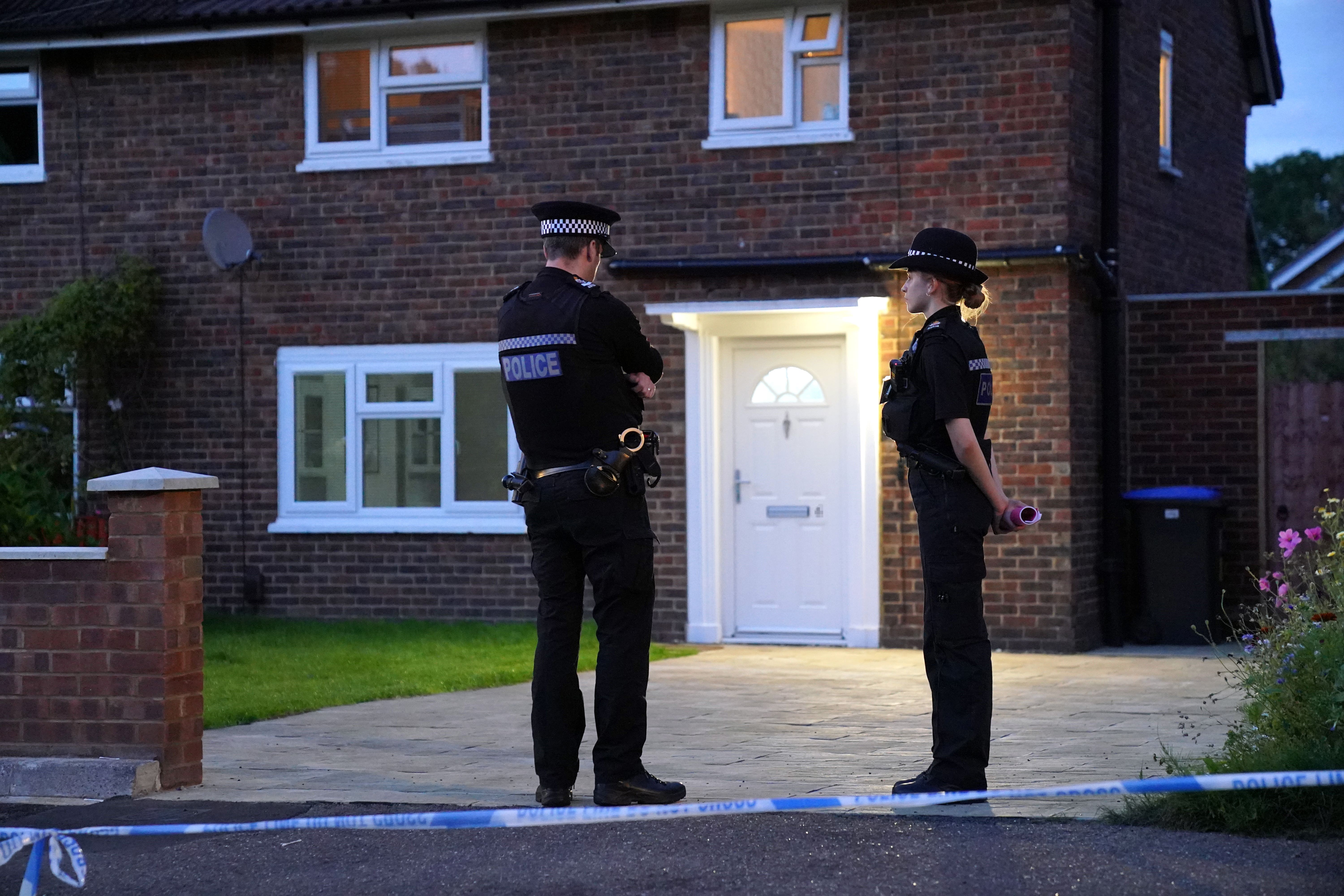 Police officers standing outside Sara’s home in Woking (Jonathan Brady/PA)