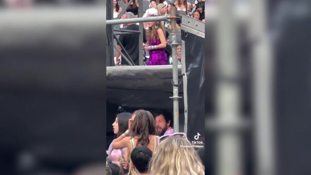 Adam Sandler waves to fans at Taylor Swift concert in Los Angeles