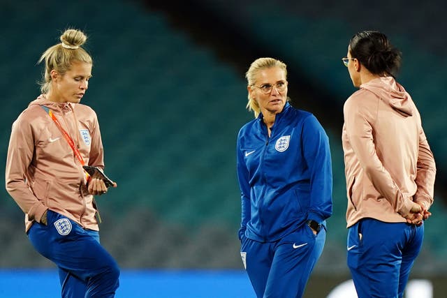 England’s Rachel Daly, head coach Sarina Wiegman and Lucy Bronze at Stadium Australia (Zac Goodwin/PA)
