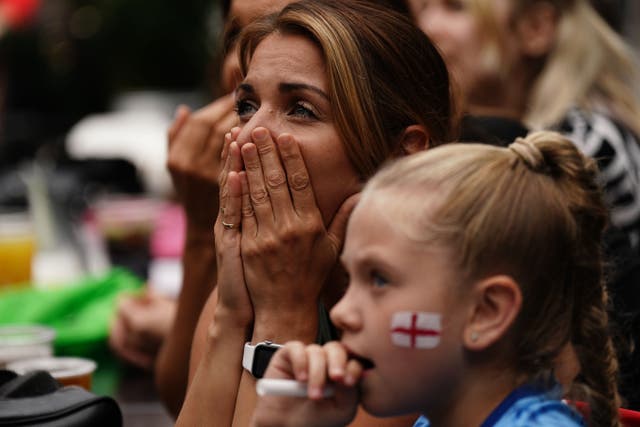 A fan is transfixed during the Fifa Women’s World Cup 2023 quarter-final match between England and Colombia (Aaron Chown/PA)