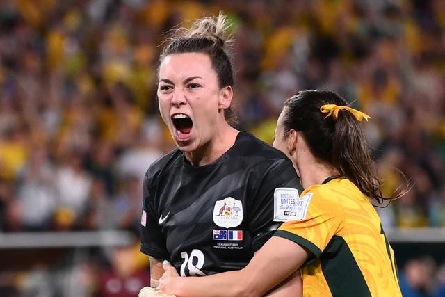 <p>Australia’s goalkeeper Mackenzie Arnold is congratulated</p>