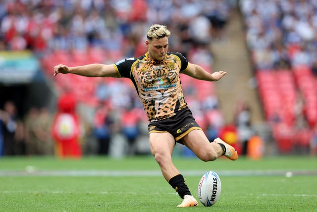 Leigh Leopards’ Lachlan Lam kicks a drop goal in golden point extra time to secure a 17-16 win over Hull KR in the Betfred Challenge Cup final at Wembley (Nigel French/PA)