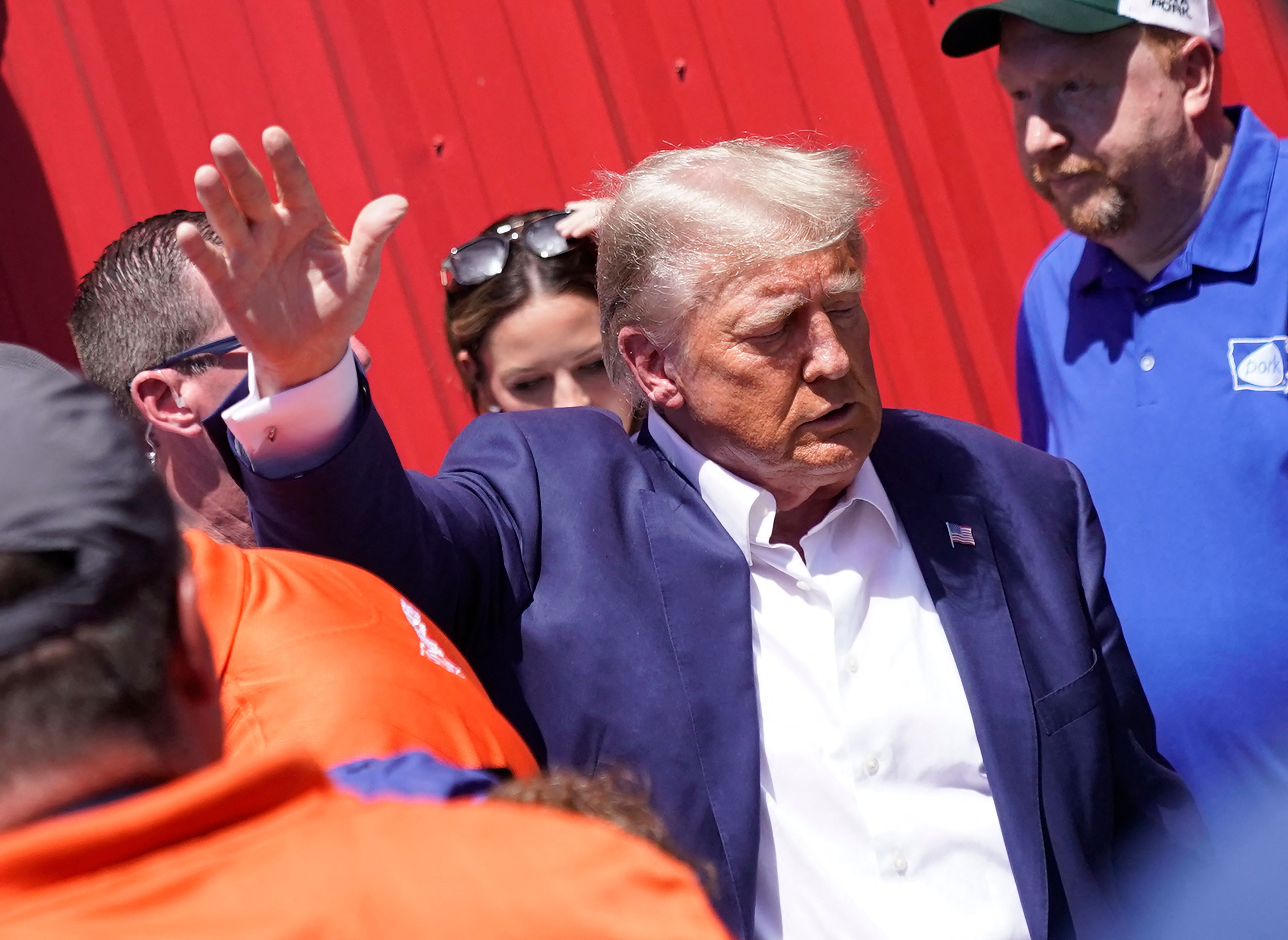 Former president and 2024 presidential hopeful Donald Trump visits the Iowa Pork Producers Tent during the Iowa State Fair in Des Moines on 12 August 2023