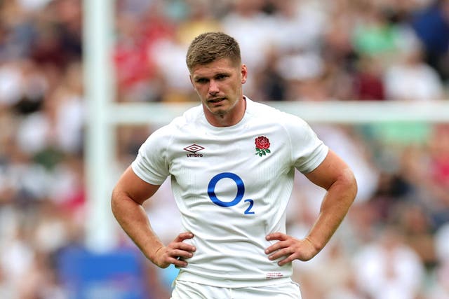 <p>Owen Farrell of England looks dejected after being carded</p>