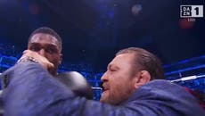 Anthony Joshua takes swig of Conor McGregor’s Irish stout after Helenius knockout