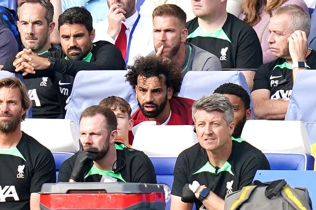 Mohamed Salah (centre) looked frustrated after being substituted against Chelsea (Adam Davy/PA)