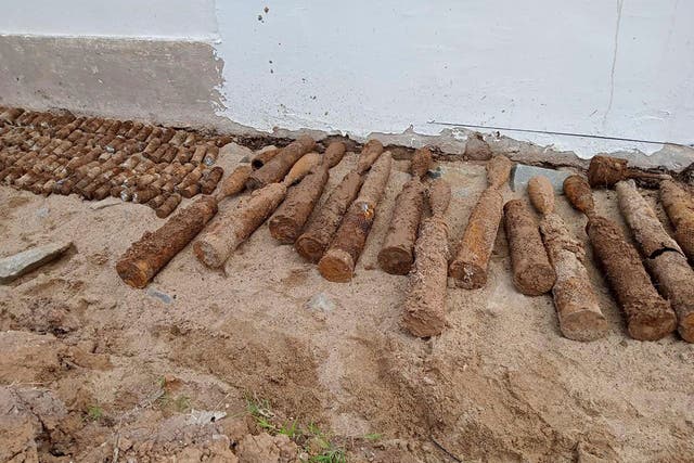 <p>This photo released by the Cambodia Mine Action Centre (CMAC) shows unexploded ordnance at Queen Kosamak High School in Kratie Province, northeastern of Phnom Penh, Cambodia, Sunday, 13 August 2023</p>