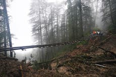 Heavy rains trigger floods and landslides in India's Himalayan region, leaving at least 22 dead