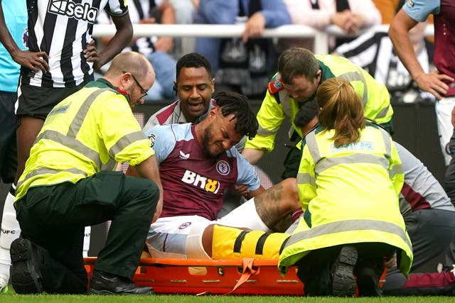 <p>Tyrone Mings was in significant pain as he went down with a knee injury against Newcastle </p>