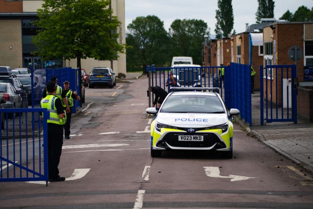Emergency services at Tewkesbury Academy in Gloucestershire following the alleged incident in July (Ben Birchall/PA)