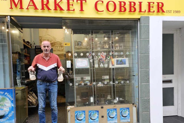 Peter Corke, owner of The Market Cobbler, mended the broken shoes after finding them on his doorstep (Peter Corke/PA)