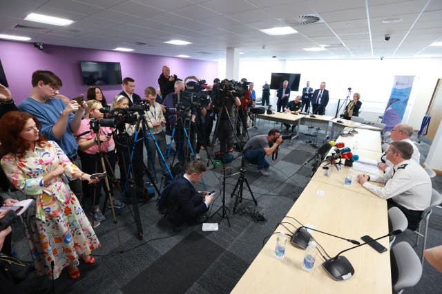 Police Service of Northern Ireland Chief Constable Simon Byrne (back right) and Assistant Chief Constable Chris Todd (front right) during a press conference (Liam McBurney/PA)
