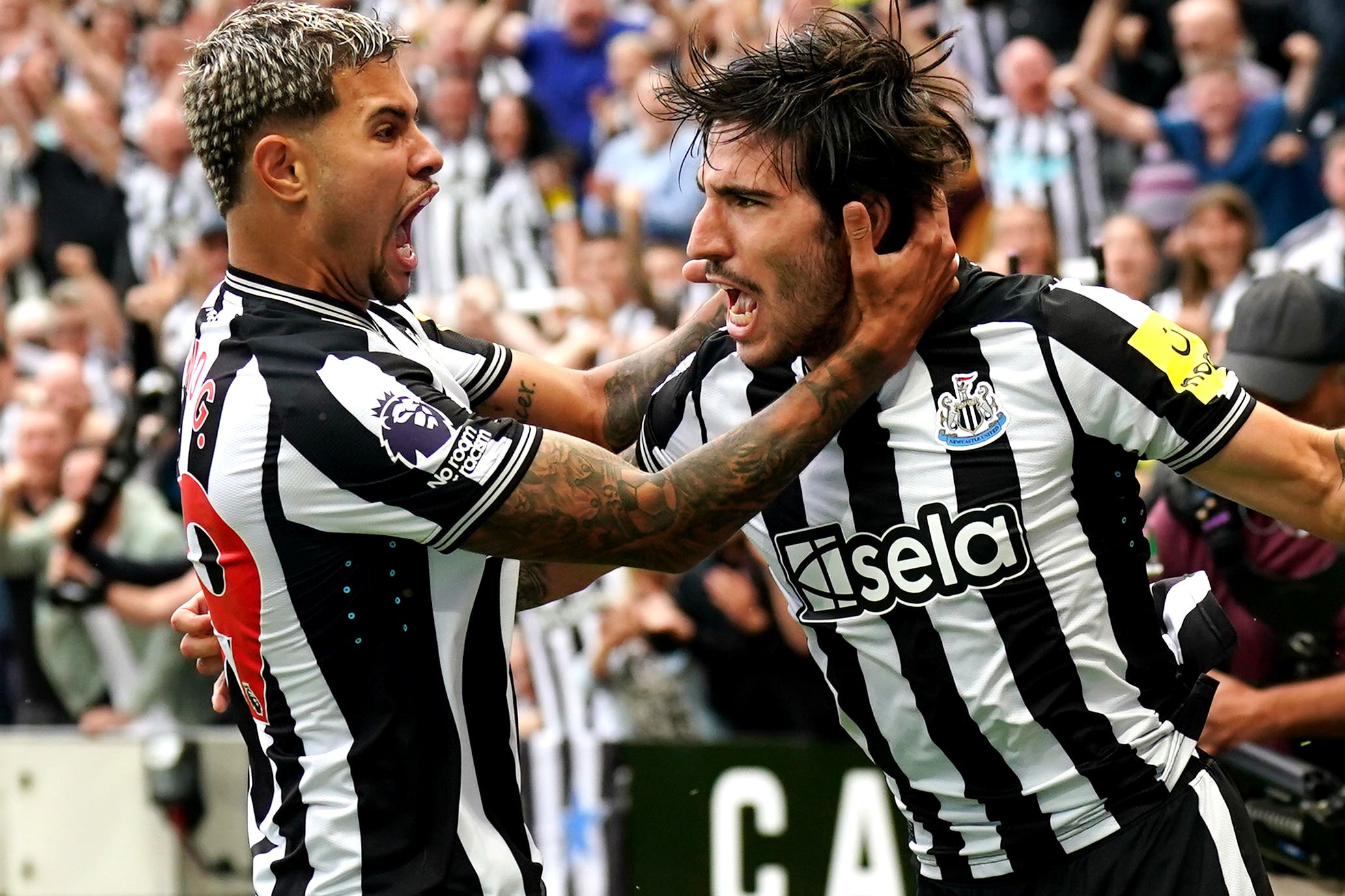 Sandro Tonali (right) scored on his first appearance for Newcastle in a 5-1 victory over Aston Villa (Owen Humphreys/PA)