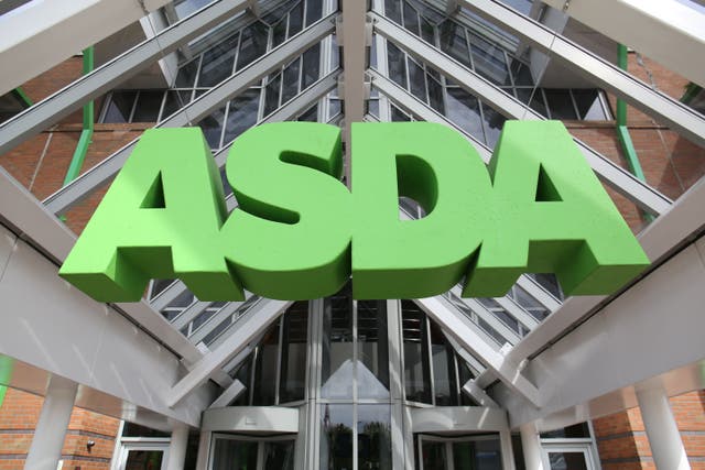 <p>General view of an Asda sign at the supermarket’s head office in Leeds (Chris Radburn/PA)</p>