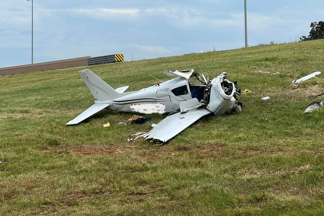 <p>The pilot of a Piper plane may have been trying to make an emergency landing when he crashed near an Oklahoma interstate on Sunday, officials say</p>