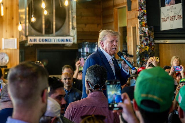 <p>Donald Trump speaks during a rally at the Steer N' Stein bar at the Iowa State Fair on August 12, 2023 in Des Moines, Iowa.</p>