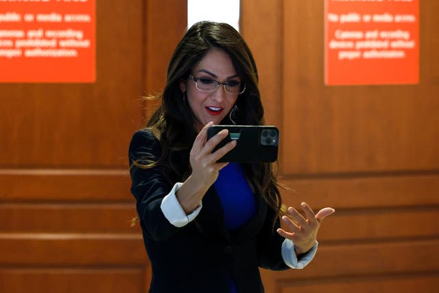 <p>Rep. Lauren Boebert (R-CO) films a video of herself before attending a briefing by U.S. Secret Service officials on the cocaine substance found at the White House on July 13, 2023 in Washington, DC</p>